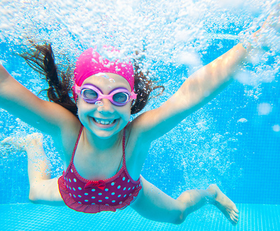 Child Swimming in Clean Pool Child Swimming in Clean Pool